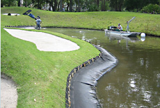 Geotube used to create desired water hazard slope